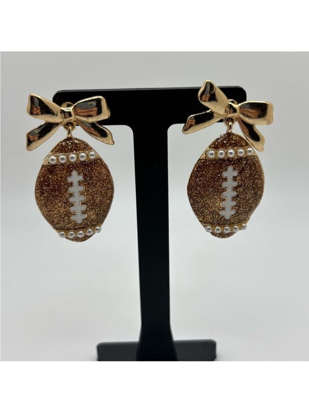 Gold and Brown Football Earrings with Bow